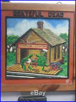 Grateful Dead's Terrapin Station hand carved album cover on wood